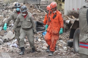 A body is recovered from the rubble in the Central Rio multiple building collapse, Rio de Janeiro, Brazil News