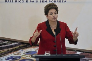 resident Rousseff speaking at a sanitation contracts award ceremony as part of the PAC program, Brazil News