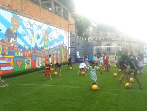 Children train for the first time on the new pitch in Caracol, Penha, Rio de Janeiro, Brazil News