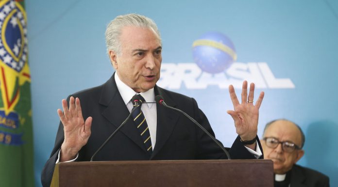 Brazil,President Temer sanctions immigration law but vetoes amnesty clause,